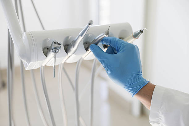 Professional Tooth Extraction technician working in Southchase, FL